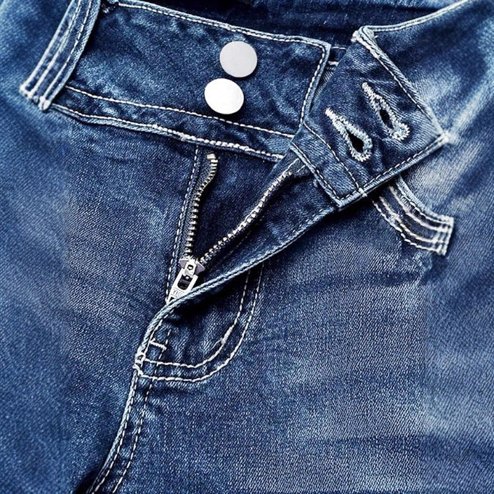 Women's high-waisted bootcut jeans with shaping waistband and visible button placket Mune Fashion