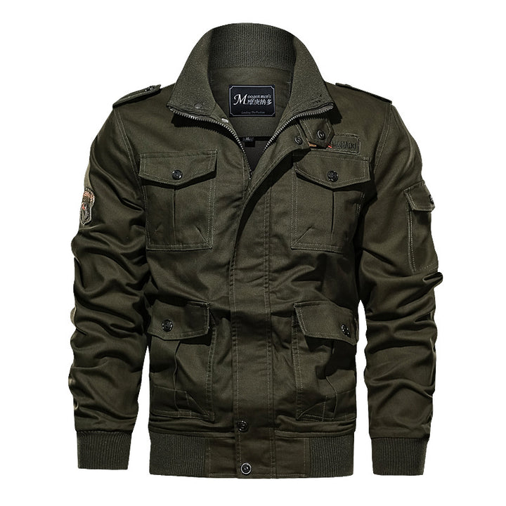 Men's rugged field jacket with multiple pockets, quilted inner lining, and ribbed cuffs.