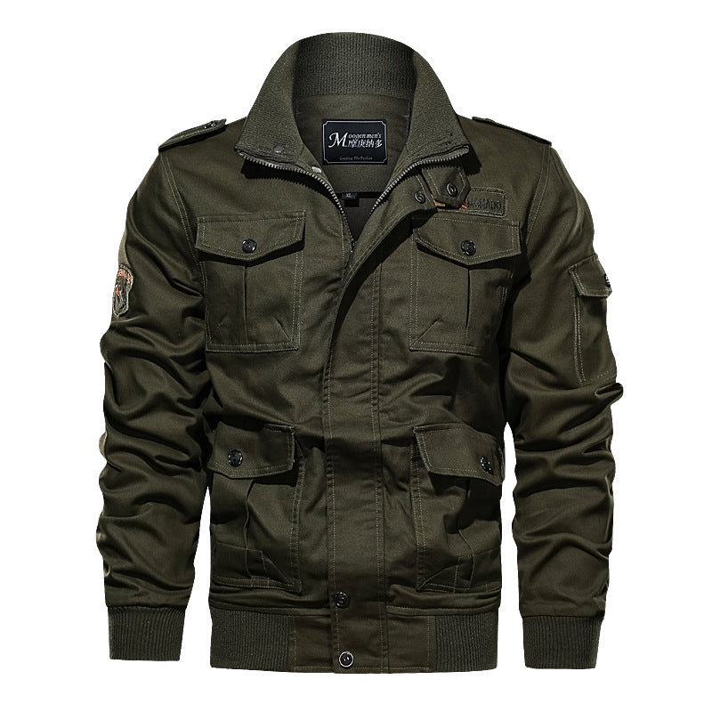 Men's rugged field jacket with multiple pockets, quilted inner lining, and ribbed cuffs.