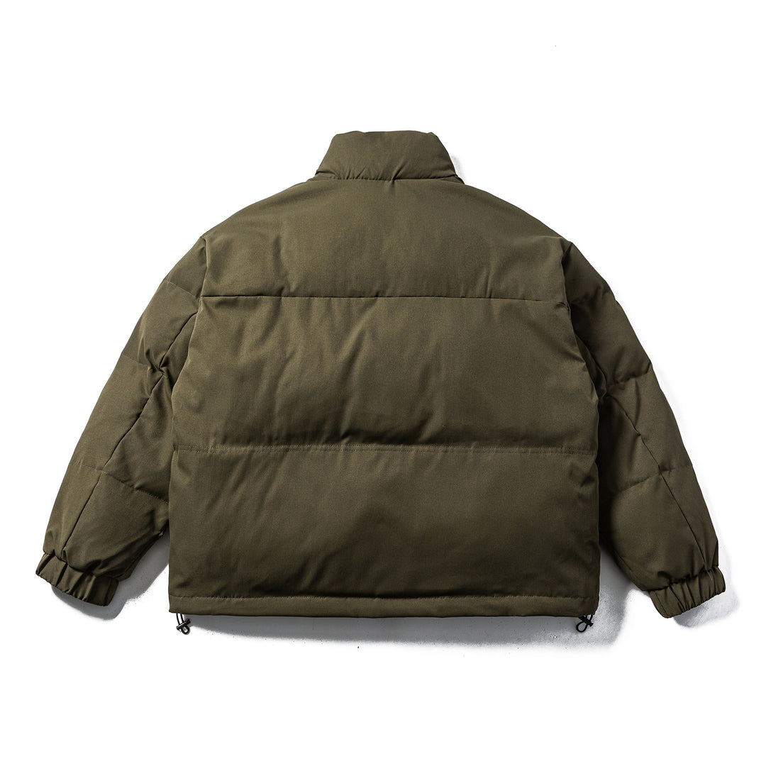 Unisex Boxy-padded Puffer jacket with high standing collar, adjustable hem and utility belt Mune Fashion