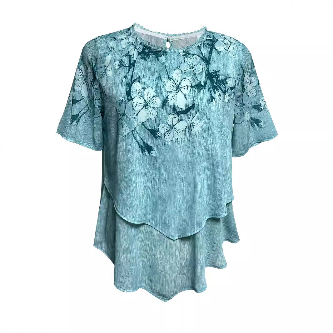 Women's two-layer blouse dress with asymmetrical tiered hem, floral print yoke, and wing sleeves Mune Fashion