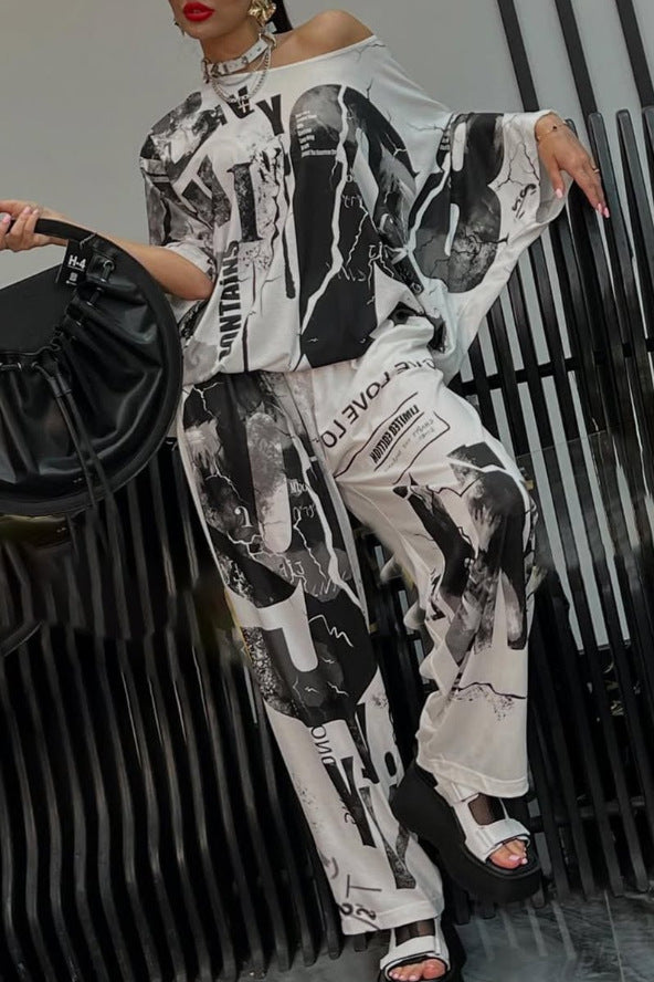 Ladies two-piece wide satin leisure set with off-shoulder batwing top and palazzo pants Mune Fashion