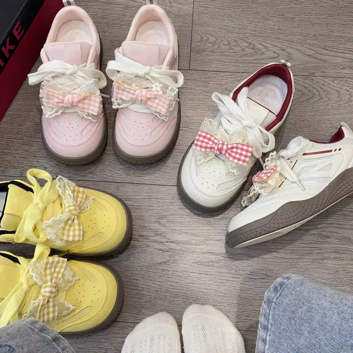 Women's sneakers with playful bow design by Mune Fashion
