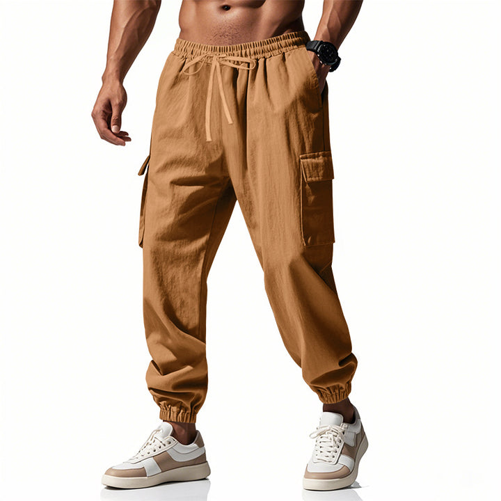Men's cargo jogger pants in utility look with elastic drawstring waistband, cuffs and extra storage Mune Fashion