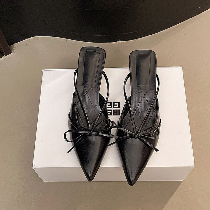 Women's pointed-toe mules with delicate slingback straps and decorative bow Mune Fashion