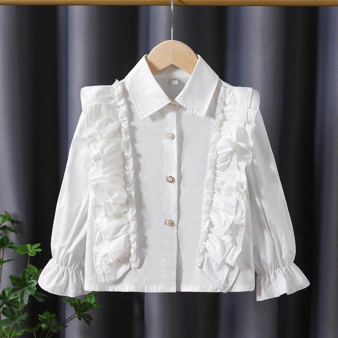 Girls blouse with ruffle details and elegant puff sleeves Mune Fashion