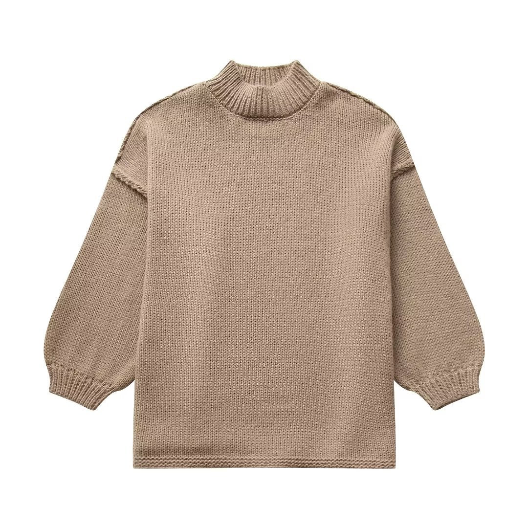 Women's chunky knit sweater with standing collar, dropped shoulders, and balloon sleeves Mune Fashion