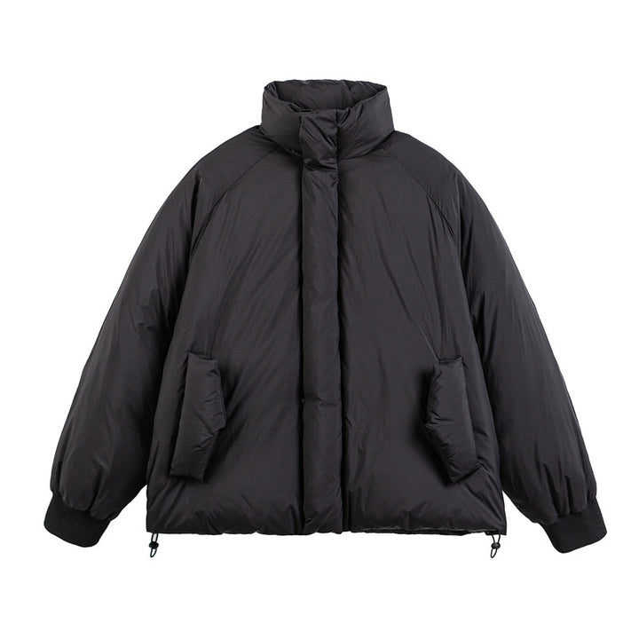 Unisex Boxy-padded short jacket with high stand-up collar, raglan sleeves and drawstring hem Mune Fashion