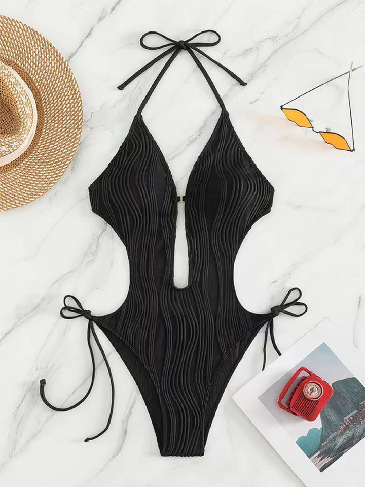 Women’s one-piece swimsuit with deep neckline and ribbed design Mune Fashion