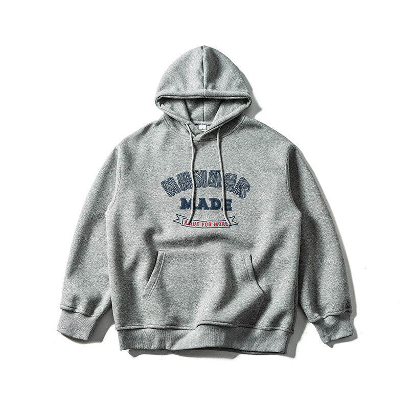 Unisex oversized college-style hoodie with kangaroo pocket Mune Fashion