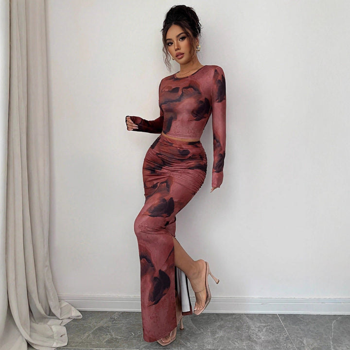 Women's two-piece fitted set made of elastic mesh with long-sleeved crop top, thumbhole, and ruched midi skirt Mune Fashion