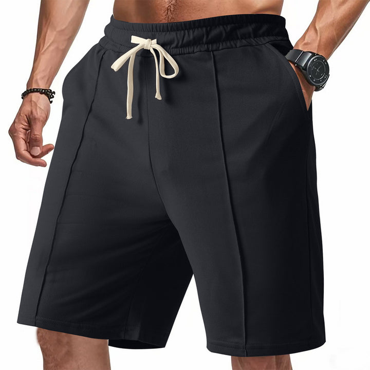 Men's knee-length relaxed Bermuda shorts with flat crease, elastic drawstring waistband and side pockets Mune Fashion