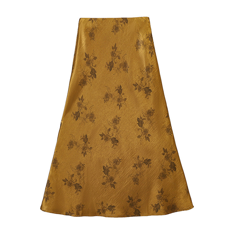 Women's high-waisted A-line midi skirt in jacquard-like satin with floral relief print.