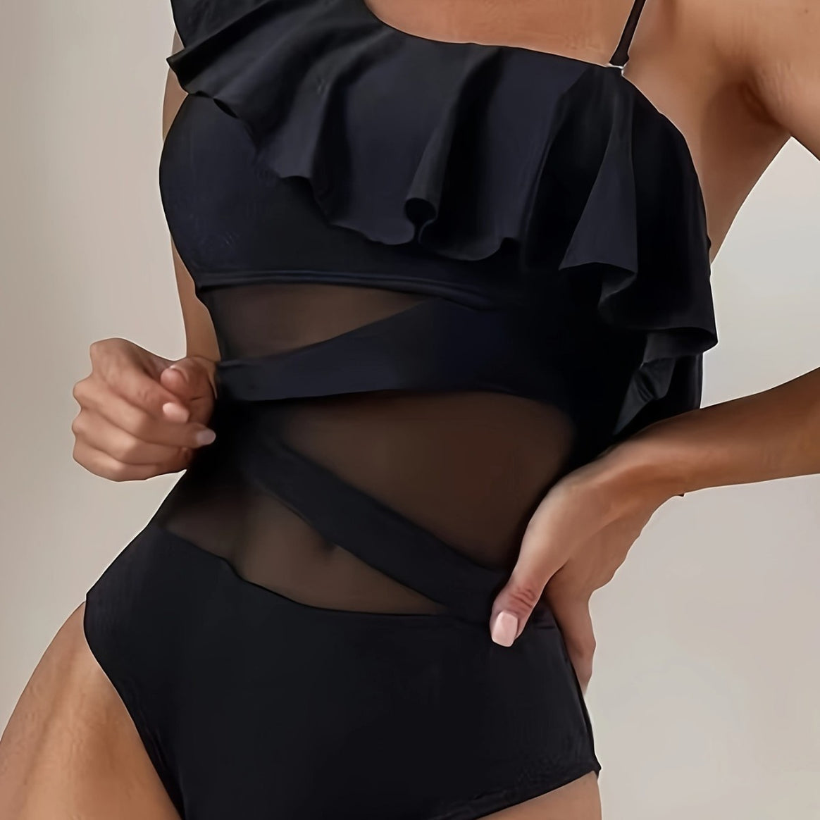 Women's one-piece swimsuit with asymmetric ruffle design and elegant cut-out details Mune Fashion