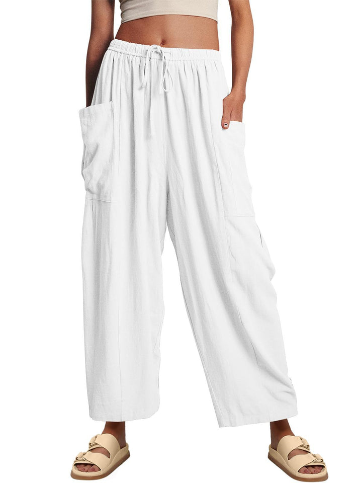Women's wide palazzo pants made from a lightweight linen blend with drawstring and side pocket Mune Fashion