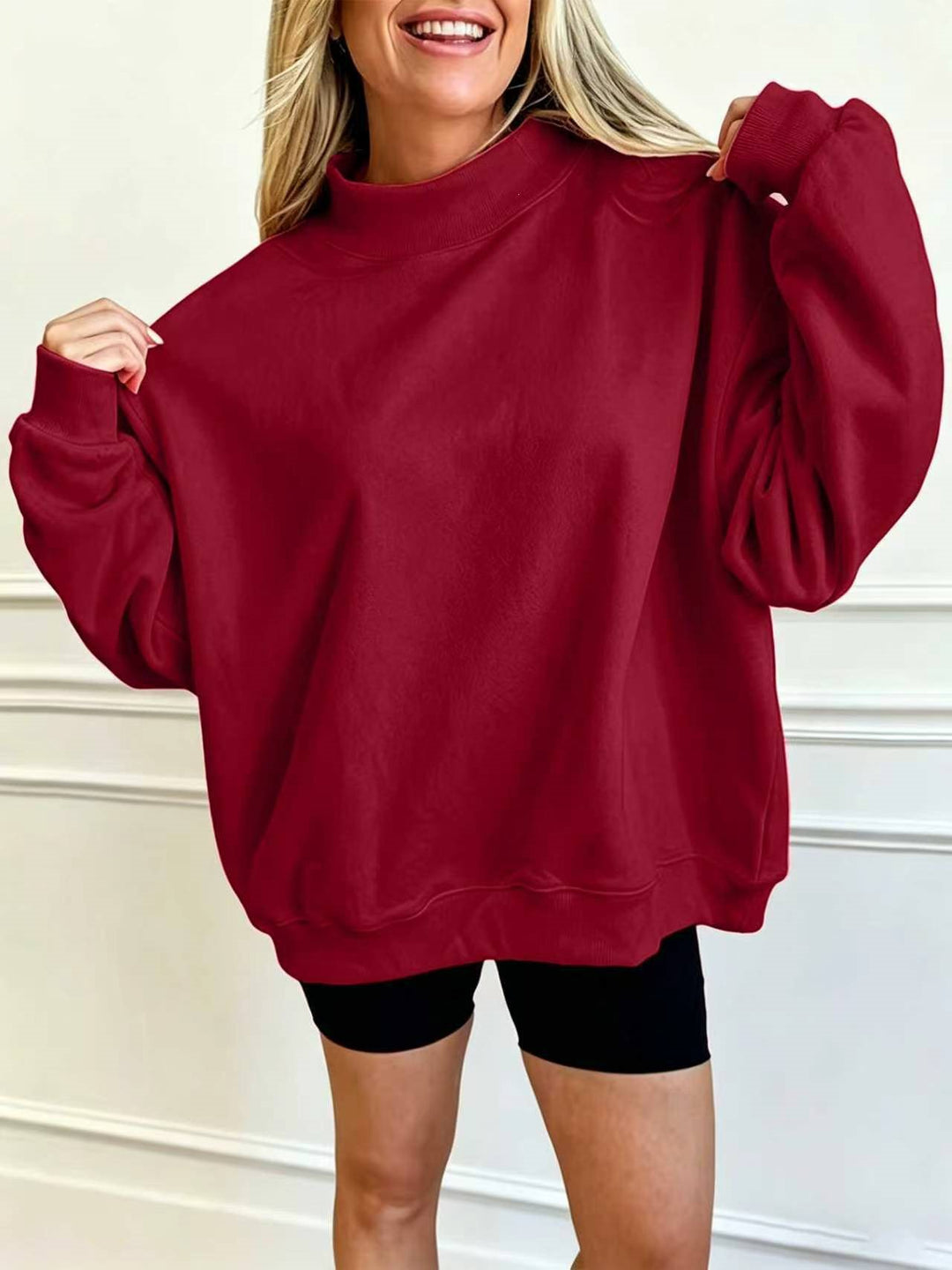 Women's Oversize Sweatshirt with Stand-Up Collar and Balloon Sleeves Mune Fashion