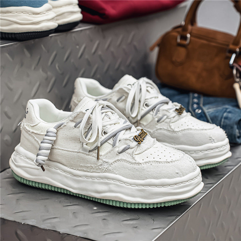 Women's denim platform sneaker with contrast stitching, padded wave sole and embellished lacing details Mune Fashion