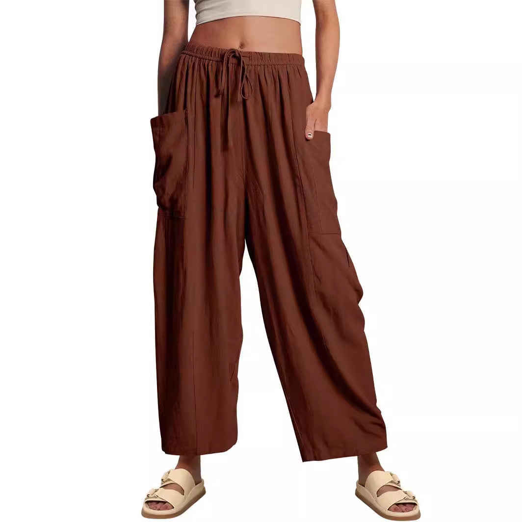 Women's wide palazzo pants made from a lightweight linen blend with drawstring and side pocket Mune Fashion