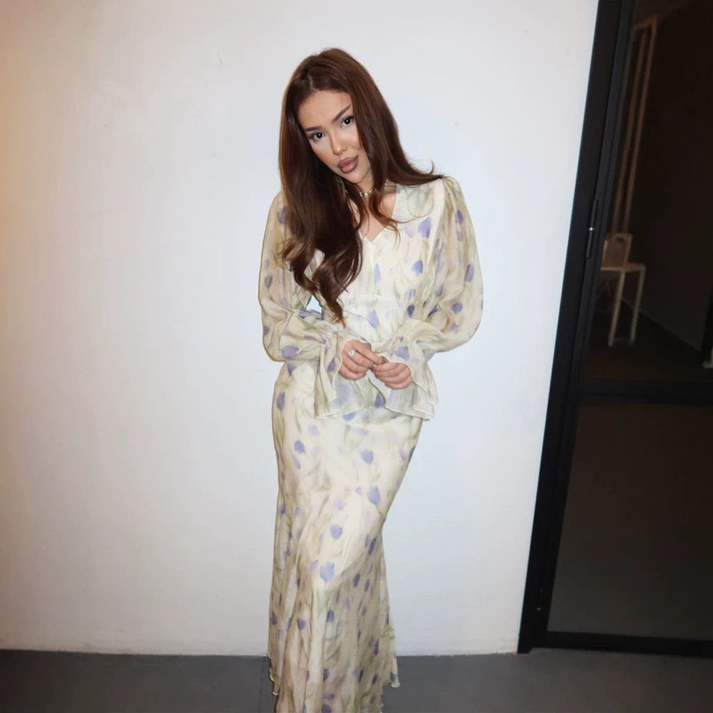 Women's dress made of transparent chiffon with fitted bodice, ruffled peplum and voluminous bell sleeves Mune Fashion