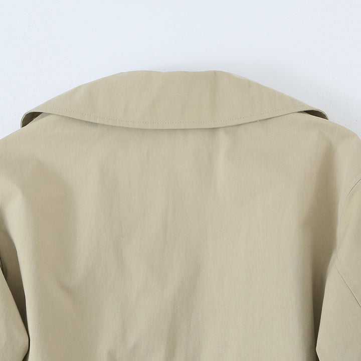 Women's short trench-style jacket with adjustable drawstring and eye-catching lapel Mune Fashion