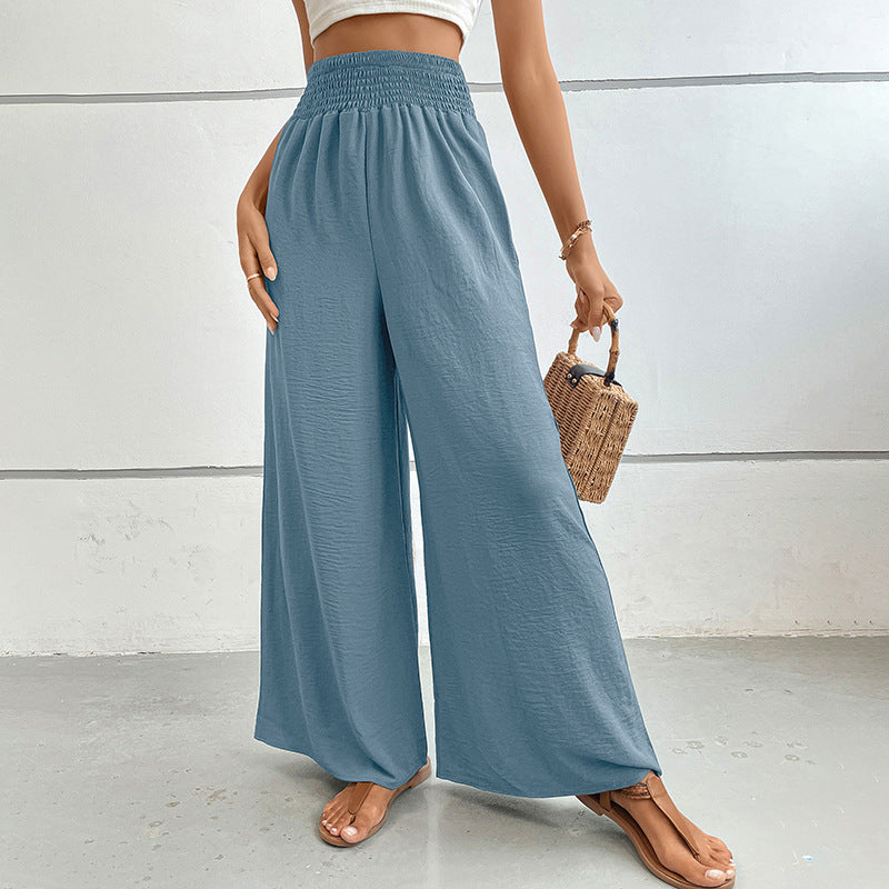 Women's palazzo pants with a high, elastic ruffled waistband and side pockets Mune Fashion