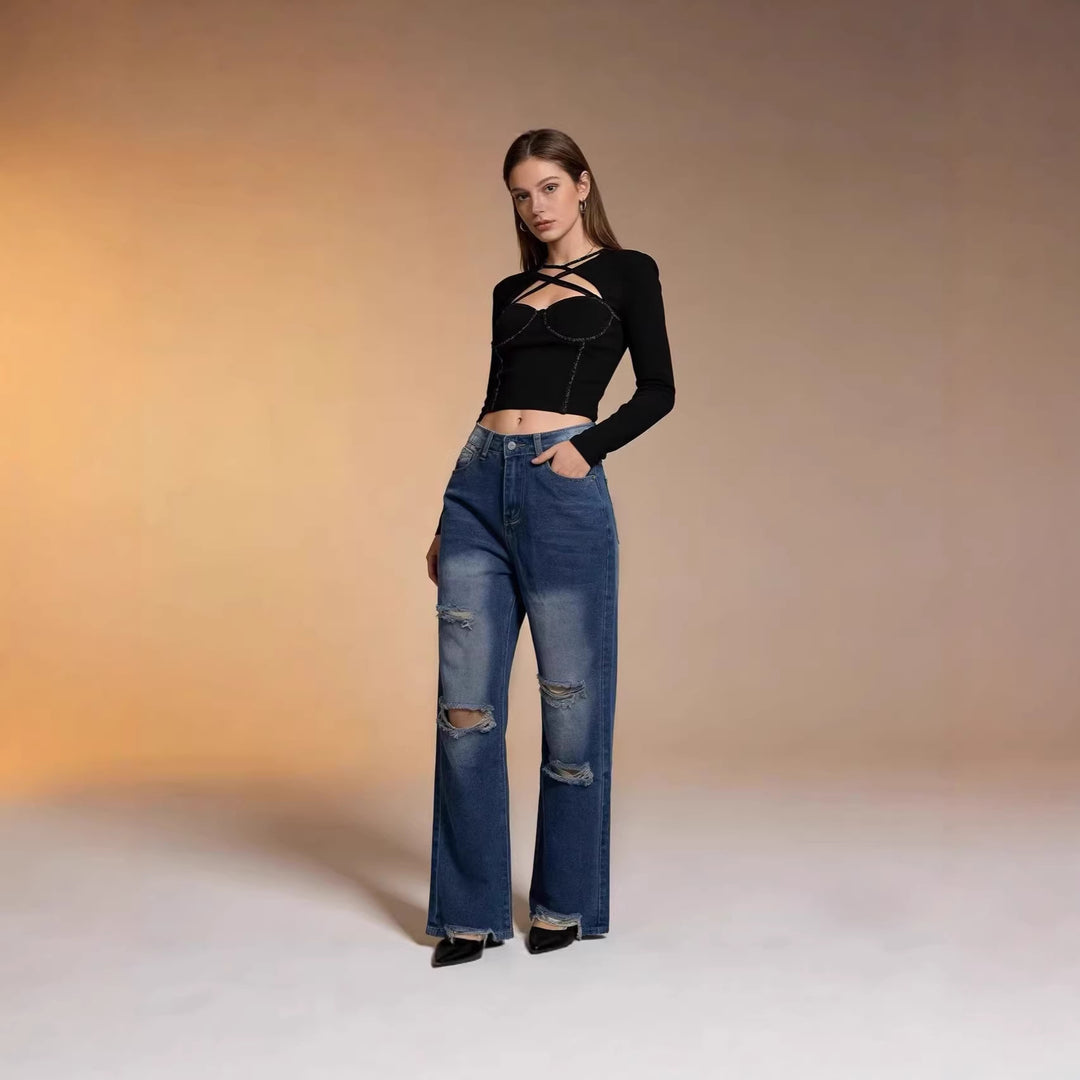 Women's high-cut relaxed jeans with wide leg, knee rips, and raw hem Mune Fashion