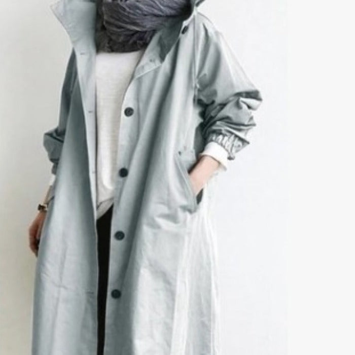 Women's lightweight oversized raincoat with hood and concealed button placket Mune Fashion