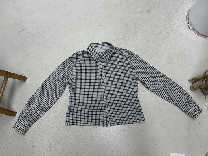 Women's fitted check blouse with concealed button placket and shaped waist seam Mune Fashion