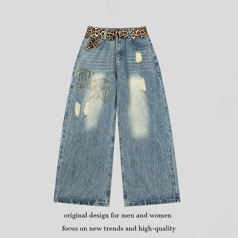 Ladies wide Palazzo jeans with destroyed details, leopard waistband and gothic embroidery Mune Fashion