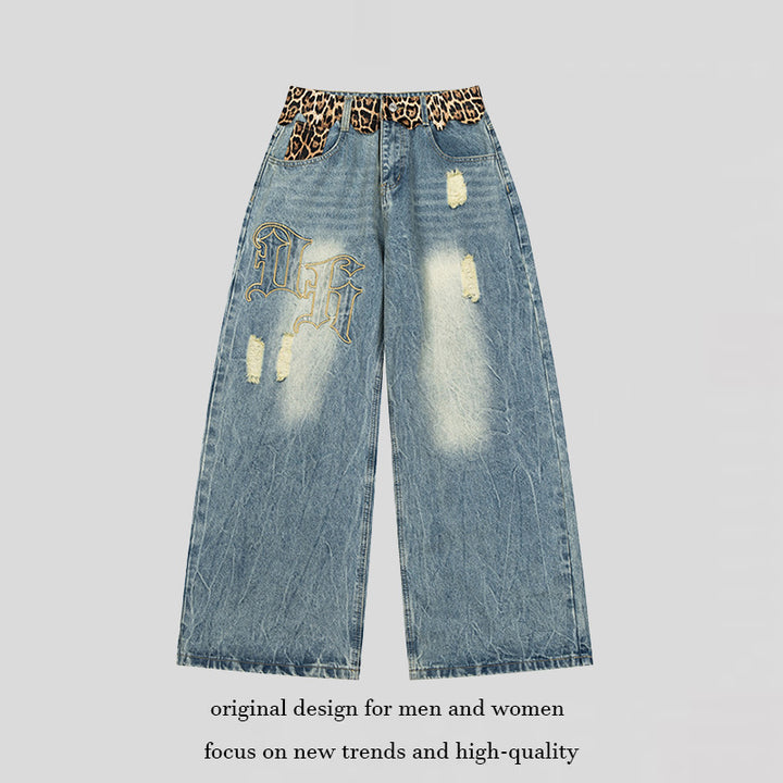 Ladies wide Palazzo jeans with destroyed details, leopard waistband and gothic embroidery Mune Fashion