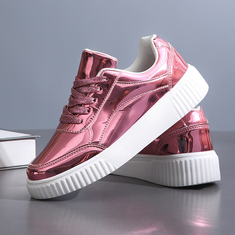 Ladies' low-cut sneakers with reflective patent upper, padded shaft, and raised outsole with groove profile Mune Fashion