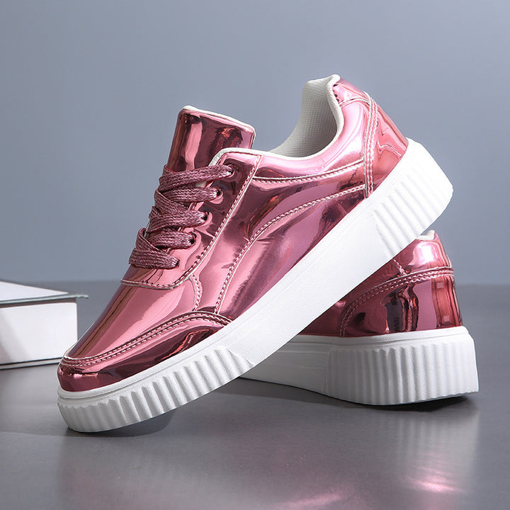 Ladies' low-cut sneakers with reflective patent upper, padded shaft, and raised outsole with groove profile Mune Fashion