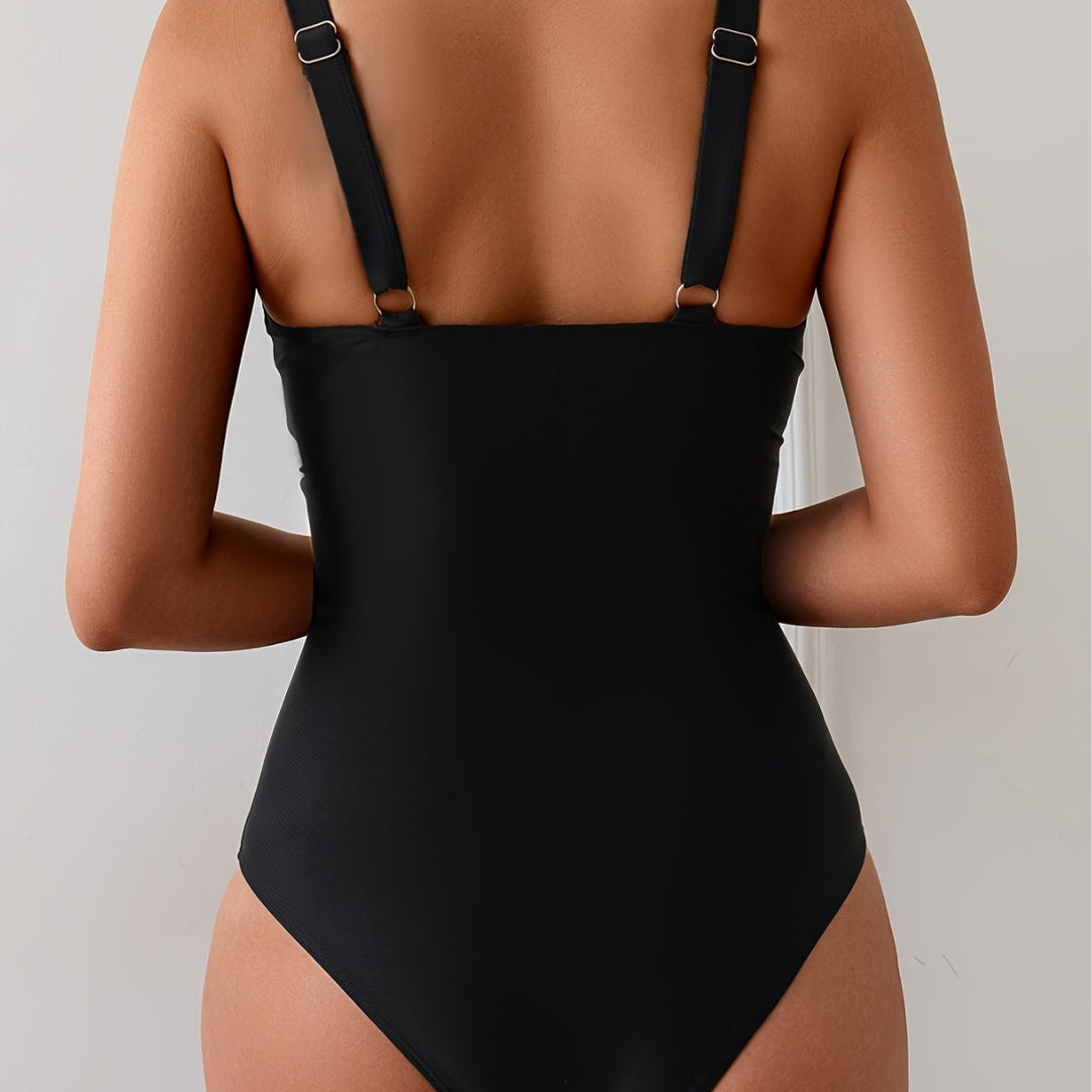Women's swimsuit with creative side inserts and sculpting effect Mune Fashion