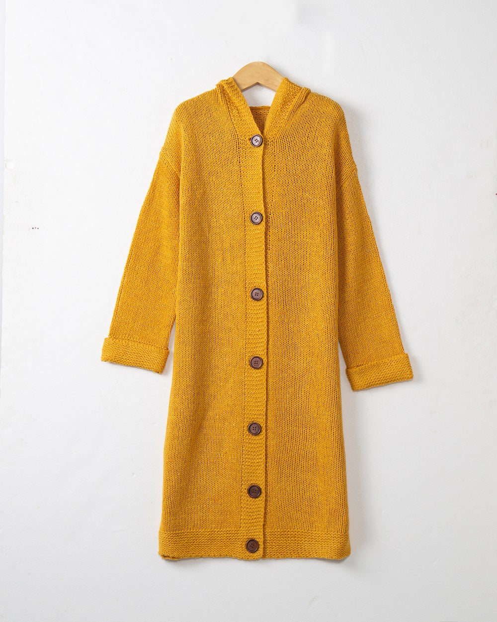Women's Hooded Long Cardigan made of medium-thick ribbed knit with a full button placket and loose oversized cut Mune Fashion