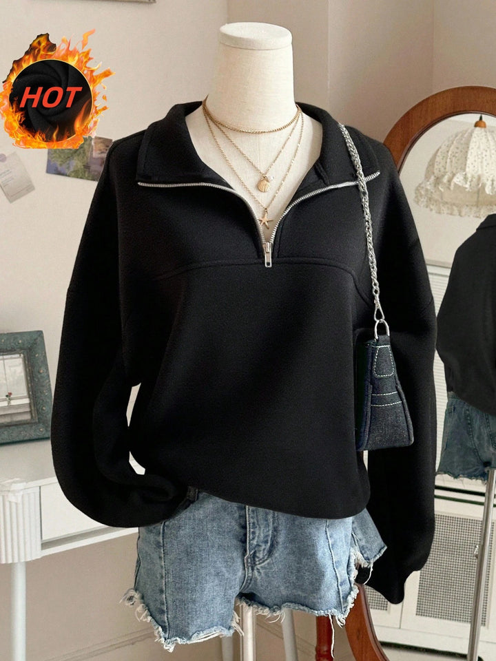Women's oversized sweatshirt with half zipper, high collar and balloon sleeves Mune Fashion