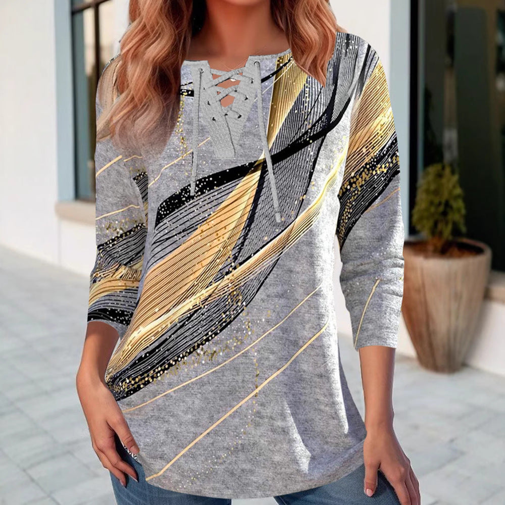 Women's long shirt with lace-up collar, three-quarter sleeves, and graphic metallic print Mune Fashion