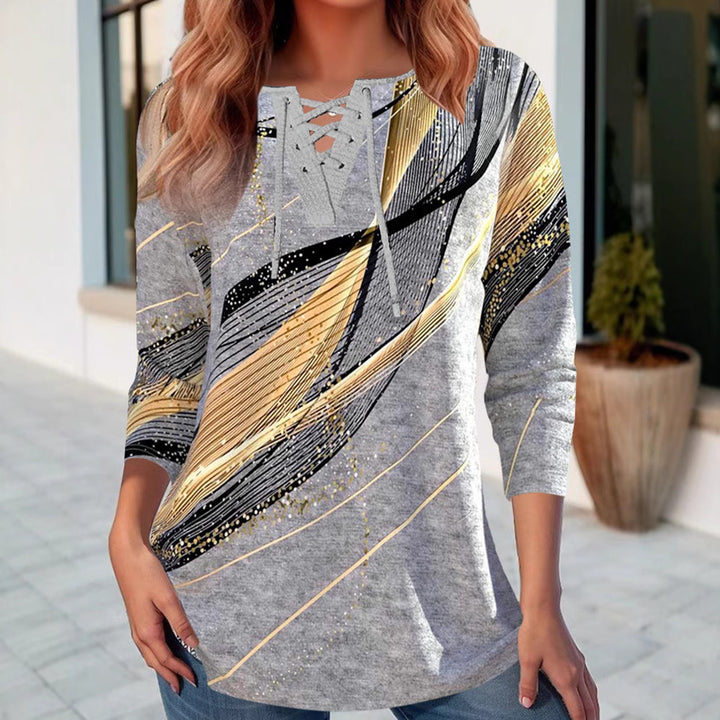 Women's long shirt with lace-up collar, three-quarter sleeves, and graphic metallic print Mune Fashion