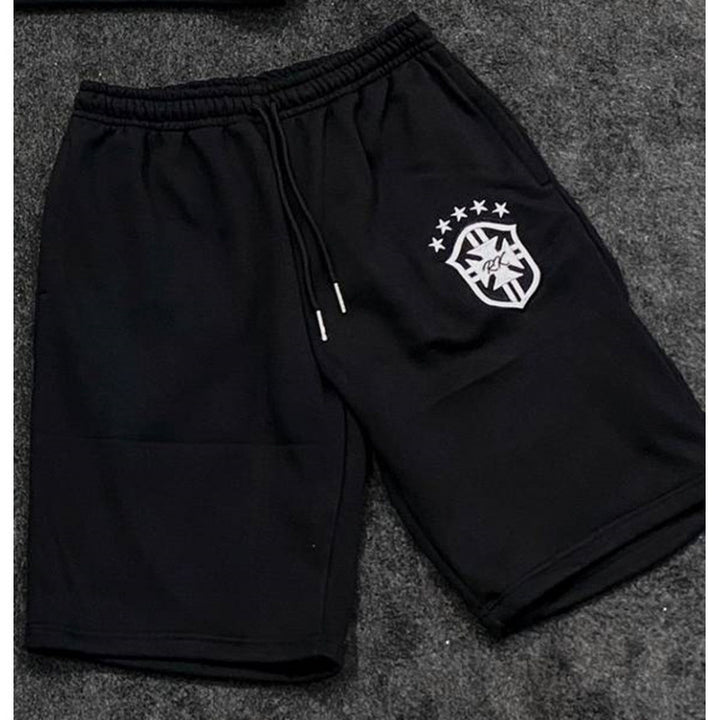 Women's loose jogging pants with elastic waistband, drawstring, and embroidered emblem Mune Fashion