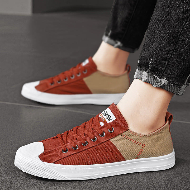 Unisex low canvas sneakers with reinforced rubber toe cap and contrasting textile panels Mune Fashion