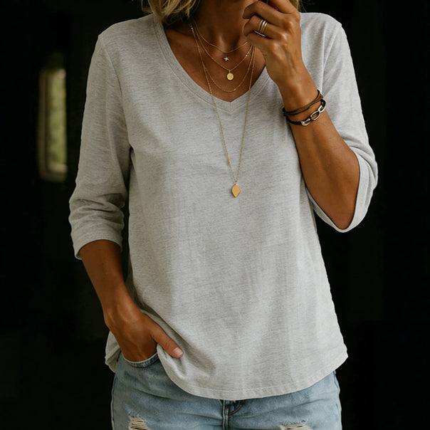 Women's Loose V-Neck Shirt with 3/4 Sleeves and Rounded Hem Mune Fashion