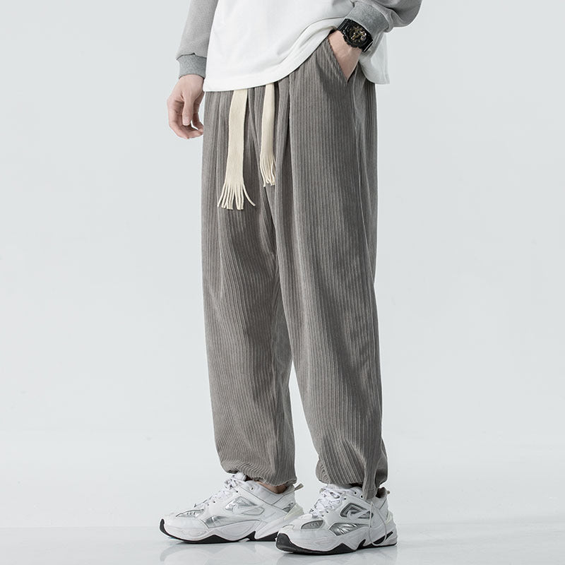 Men's loose-fitting corduroy pants with wide leg, elastic waistband and decorative drawstring Mune Fashion