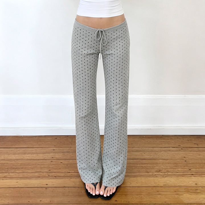 Women's comfortable high-waist lounge pants with wide flare, elastic comfort waistband, drawstring, and subtle dot print Mune Fashion