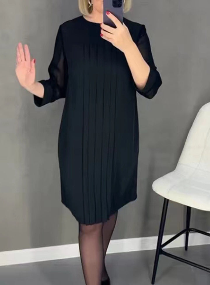 Ladies nan pleated sheath dress with knee-length silhouette and transparent three-quarter sleeves Mune Fashion