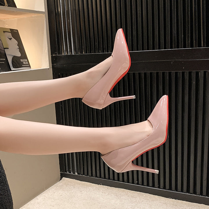 Women's pointed toe patent pumps with sculptural stiletto heel and contrasting outsole Mune Fashion