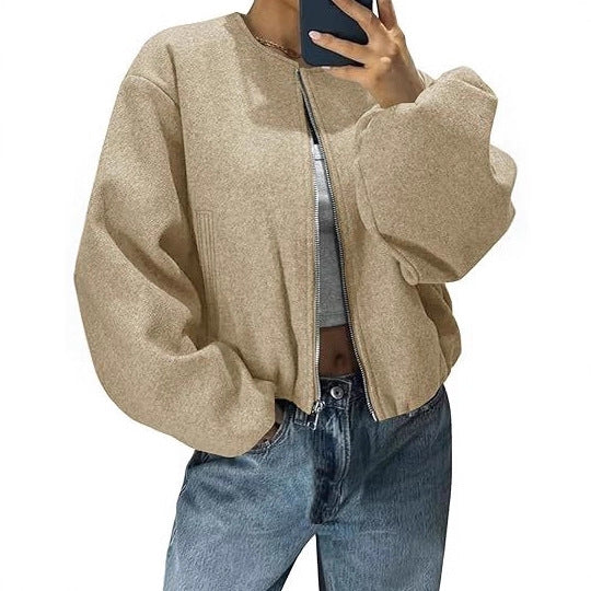 Women's short jacket with continuous zipper, balloon sleeves, and elastic hem Mune Fashion
