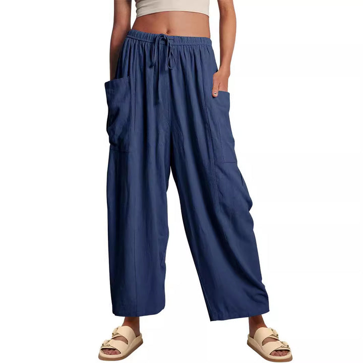 Women's wide palazzo pants made from a lightweight linen blend with drawstring and side pocket Mune Fashion