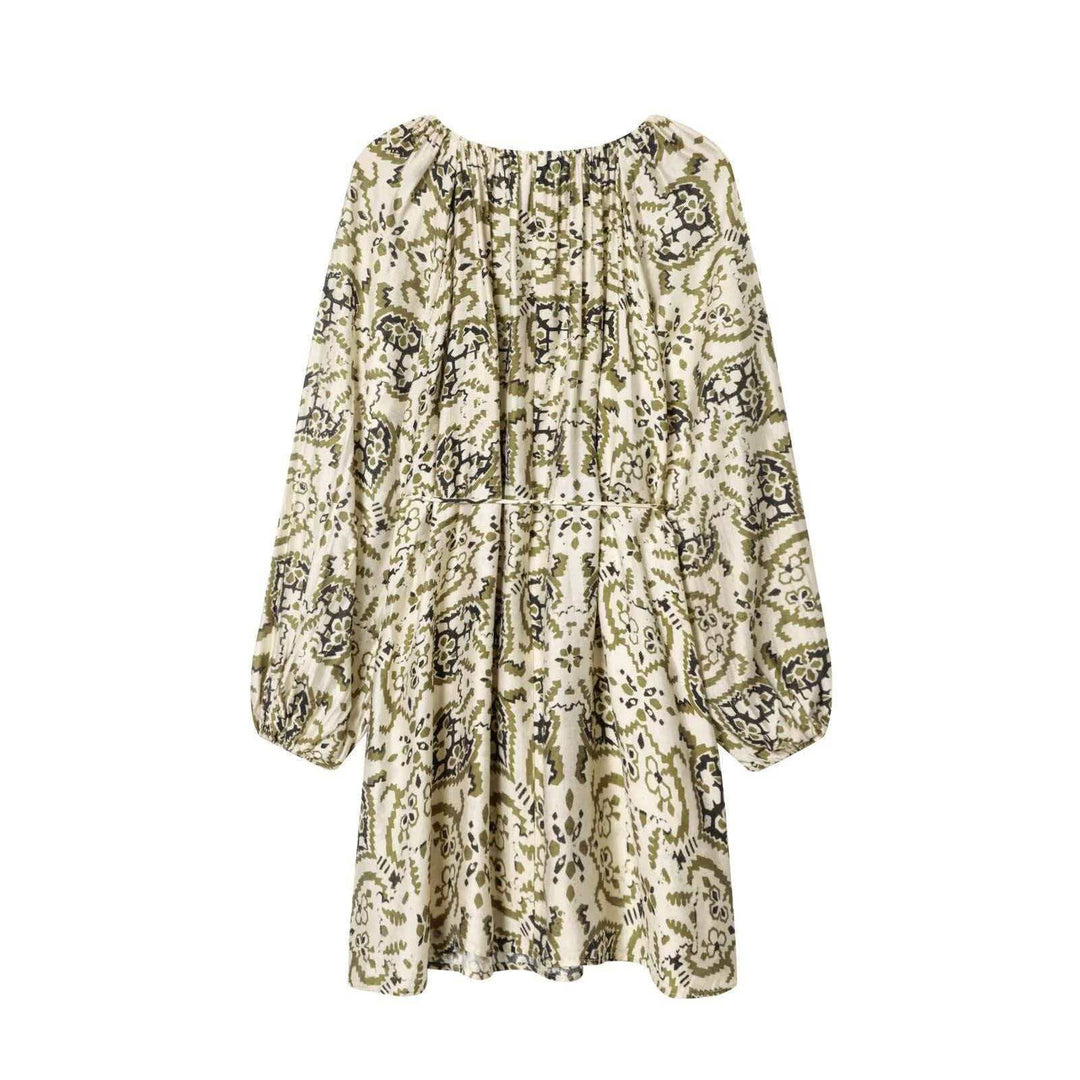 Women’s airy pleated dress with a Carmen collar, wide balloon sleeves, and adjustable drawstring Mune Fashion