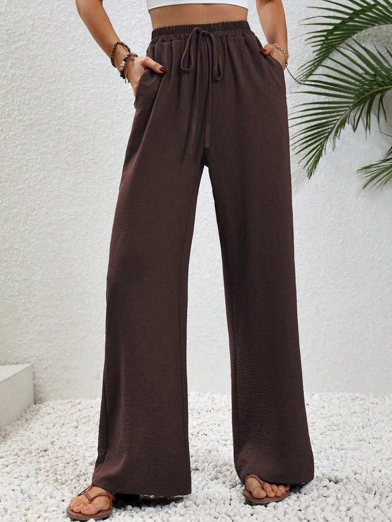 Ladies lightweight, loose-fitting beach pants with elastic waistband, drawstring and side pockets Mune Fashion