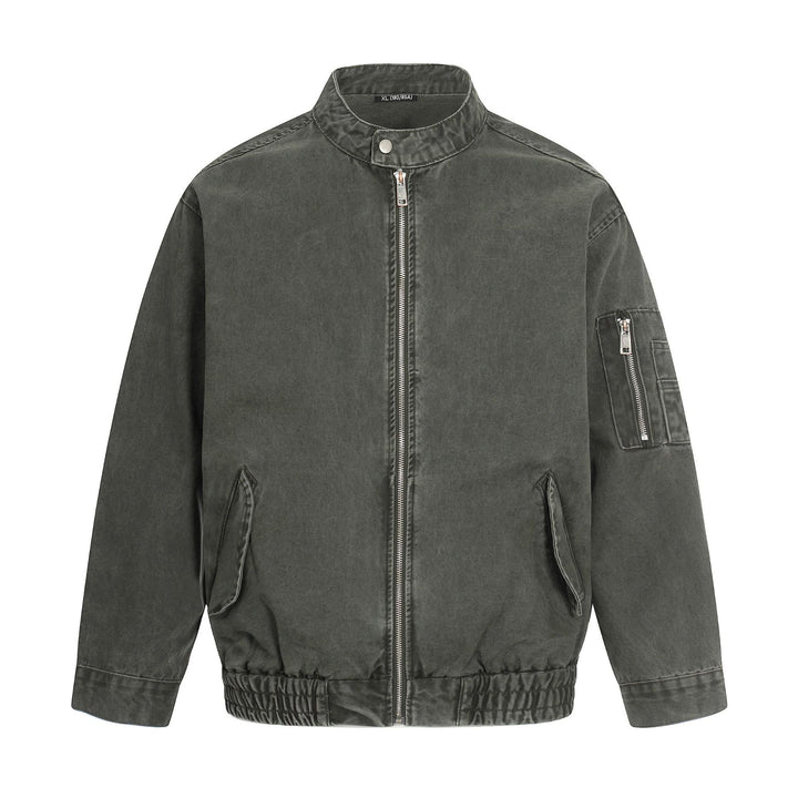 Men's short cut vintage-wash bomber jacket in boxy cut with stand-up collar and sleeve zip.