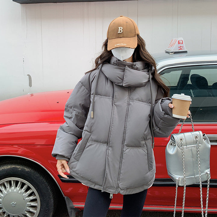 Women's slightly padded oversized quilted jacket with hood and concealed zipper Mune Fashion
